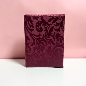 Vintage ornate fabric photo album